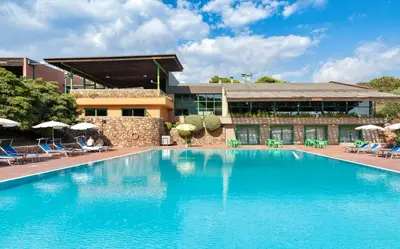 Piscina di ISA-Ecovillage with swimming-pool in Teulada surrounded by greenery just 400 meters from the sea o nelle vicinanze