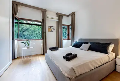 Letto o letti in una camera di GuestHost - Casa Domu de Jana in Cagliari!