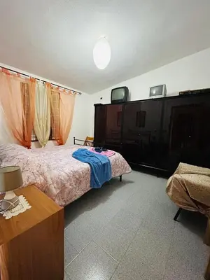 Letto o letti in una camera di Casa EMMID