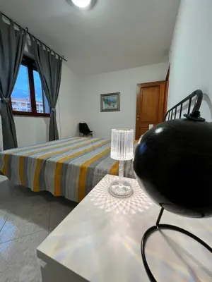 Letto o letti in una camera di Luminoso appartamento