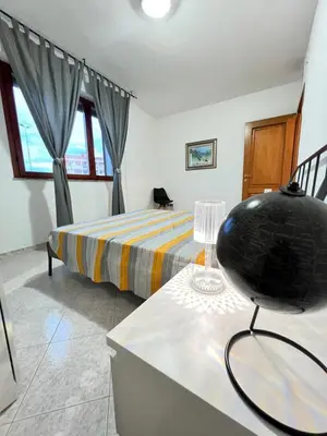 Letto o letti in una camera di Luminoso appartamento