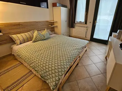 Letto o letti in una camera di Casa l'ulivo