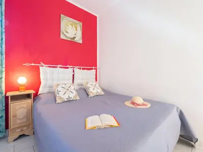 Letto o letti in una camera di Holiday Home Domus Centro by Interhome