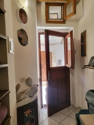 Area soggiorno di La piccola casetta nel centro storico