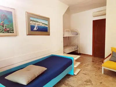 Area soggiorno di Residenza Le Scalette - Appartamento piano terra con affaccio primo piano