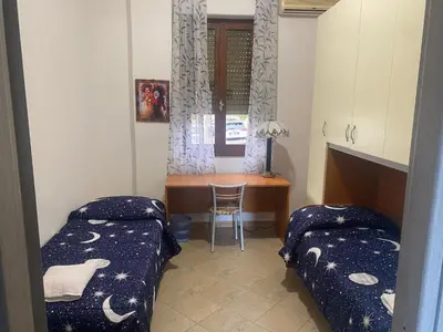 Letto o letti in una camera di Luna bianca