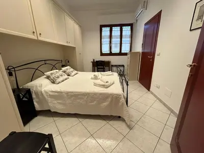 Letto o letti in una camera di Lovely Guesthouse QSE