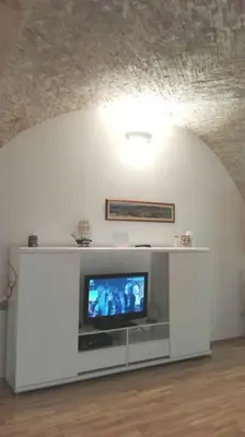 TV o dispositivi per l'intrattenimento presso Ibiscus apartment