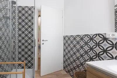 Letto o letti in una camera di GuestHost - Two ApartmentS in Centre of Carloforte!