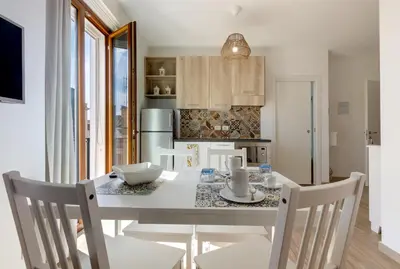 Cucina o angolo cottura di GuestHost - Two ApartmentS in Centre of Carloforte!