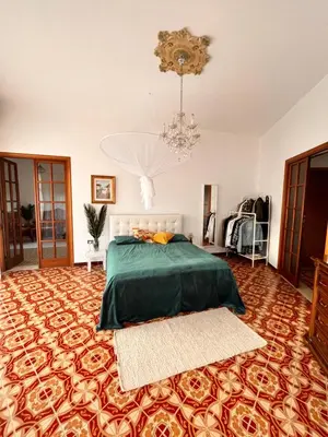 Letto o letti in una camera di Casa dei nonni
