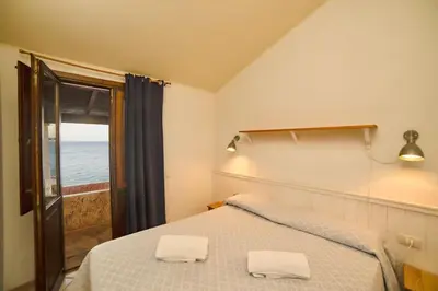 Letto o letti in una camera di Villas in Porto Corallo just 400 meters from the sea