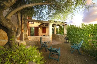 Giardino di ISA-Villas in Porto Corallo just 400 meters from the sea