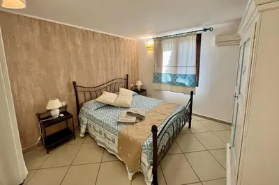 Letto o letti in una camera di Casa asfodelo