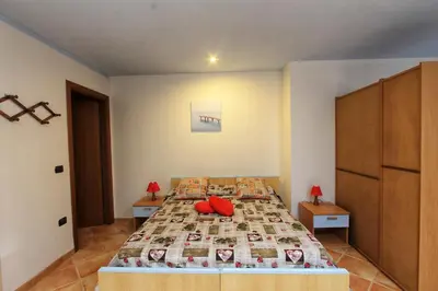 Letto o letti in una camera di Monolocale Cartuceddu 6b