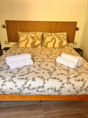 Letto o letti in una camera di B&B La Panoramica