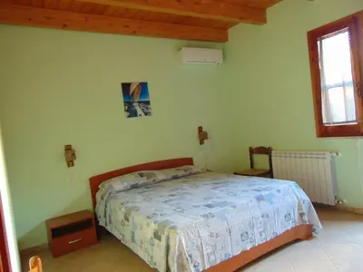 Letto o letti in una camera di La Contea
