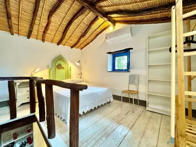 Letto o letti in una camera di La Corte del Carrubo & SPA - Tiny House