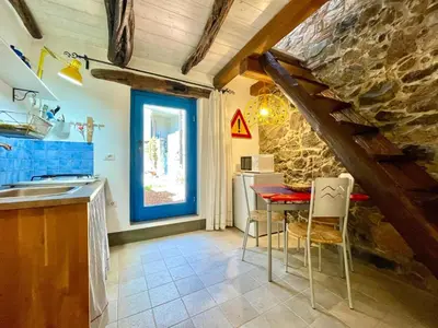 Cucina o angolo cottura di La Corte del Carrubo & SPA - Tiny House