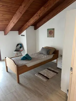 Letto o letti in una camera di Appartamento L'Oliveto