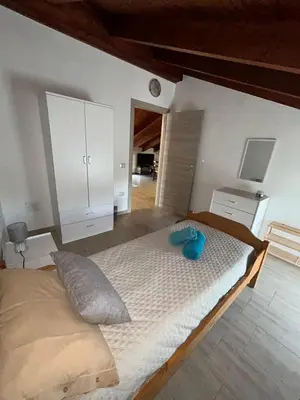 Letto o letti in una camera di Appartamento L'Oliveto