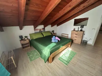 Letto o letti in una camera di Appartamento L'Oliveto