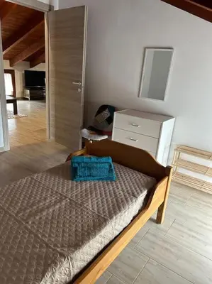 Letto o letti in una camera di Appartamento L'Oliveto