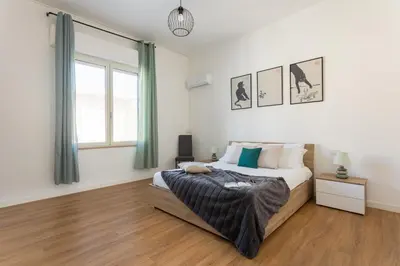 Letto o letti in una camera di Casa Levante - Near the station and city center