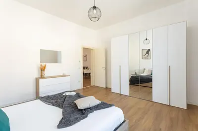 Letto o letti in una camera di Casa Levante - Near the station and city center