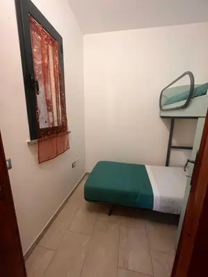 Letto o letti in una camera di Sole mare 3
