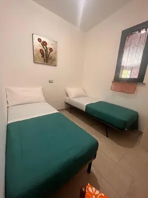 Letto o letti in una camera di Sole mare 3