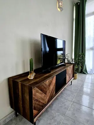 TV o dispositivi per l'intrattenimento presso Villa Mary Holiday Home Near Villasimius