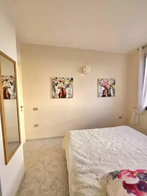 Letto o letti in una camera di Villa Mary Holiday Home Near Villasimius
