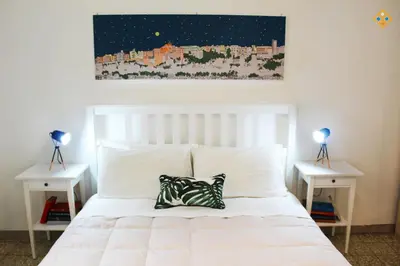 Letto o letti in una camera di Sa Domu de Ajaja Apartments