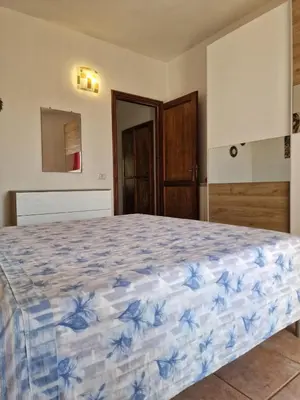 Letto o letti in una camera di Casa Marina