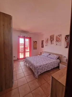 Letto o letti in una camera di Casa Marina