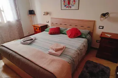 Letto o letti in una camera di Flowers House Appartamento a Quartu S Elena