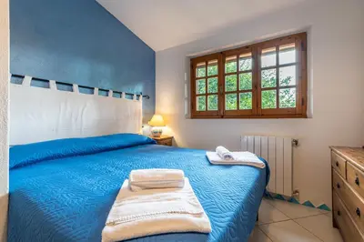 Letto o letti in una camera di Casa Vacanze Airone
