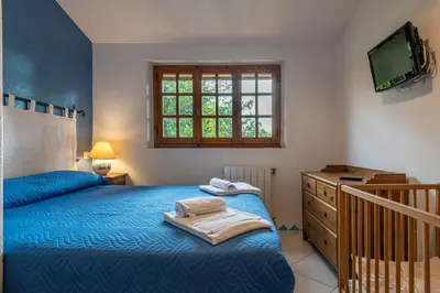 Letto o letti in una camera di Casa Vacanze Airone