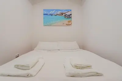 Letto o letti in una camera di Marina Centro città in pieno centro storico