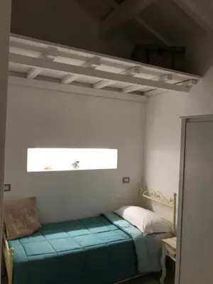 Letto o letti in una camera di Villamereu