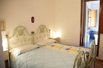 Letto o letti in una camera di Su Livariu