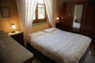 Letto o letti in una camera di Su Livariu