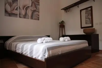Letto o letti in una camera di Lodgings in Sardinia