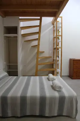 Letto o letti in una camera di Lodgings in Sardinia