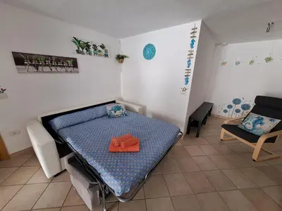 Letto o letti in una camera di Summer House
