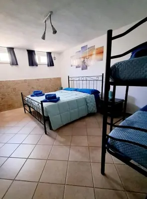 Letto o letti in una camera di Summer House