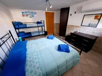 Letto o letti in una camera di Summer House