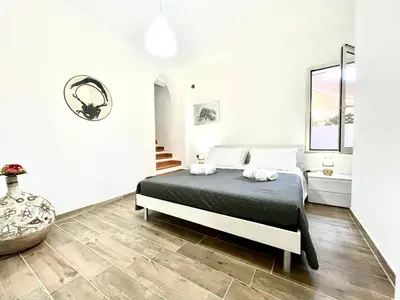 Letto o letti in una camera di Teddy House Apartments