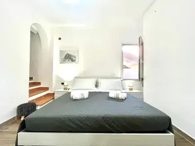 Letto o letti in una camera di Teddy House Apartments